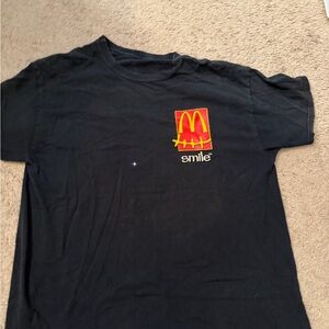 Cactus Jack by Travis Scott Black Tee with Red and Yellow Graphic